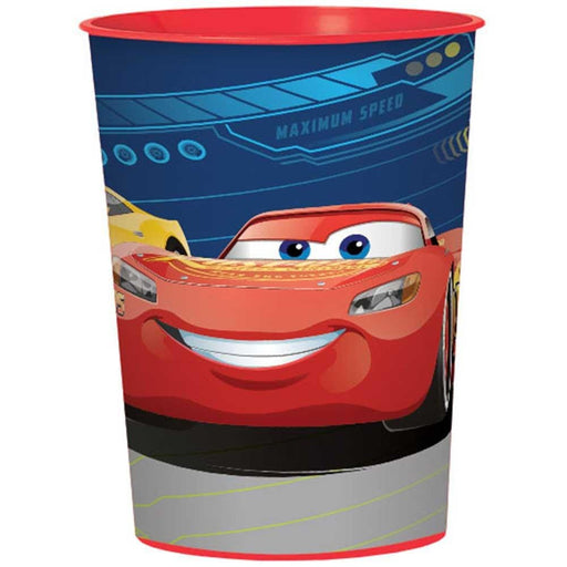 Plastic party cup featuring Disney Pixar Cars design with Lightning McQueen smiling on a dark blue background with futuristic speed graphics, red rim at the top.