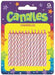 Package of pink and white spiral-striped candles arranged vertically on a yellow background, with a purple header that has colorful stars and the word 'Candles' in green lettering.