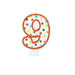 White number 9 birthday candle with an orange outline and multicolored polka dots in red, green, yellow, and blue.