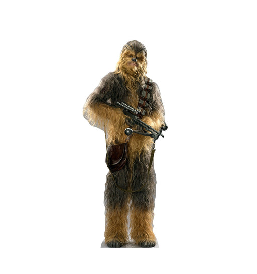 Cutout standee of Chewbacca from Star Wars, depicted as a tall Wookiee with brown fur, wearing a bandolier and carrying a bowcaster.