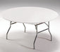 Circular stay-put tablecloth in white, securely fitted over a folding banquet table with metal legs, designed to prevent slipping during events or gatherings.