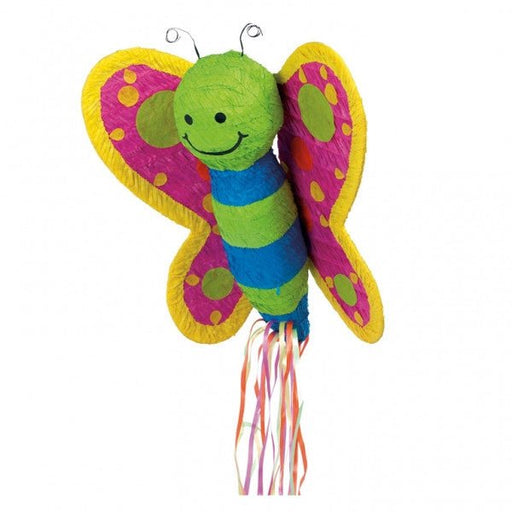 A colorful butterfly piñata with a smiling green face, blue and green striped body, pink and yellow wings with polka dots, and multicolored ribbon streamers hanging from the bottom.