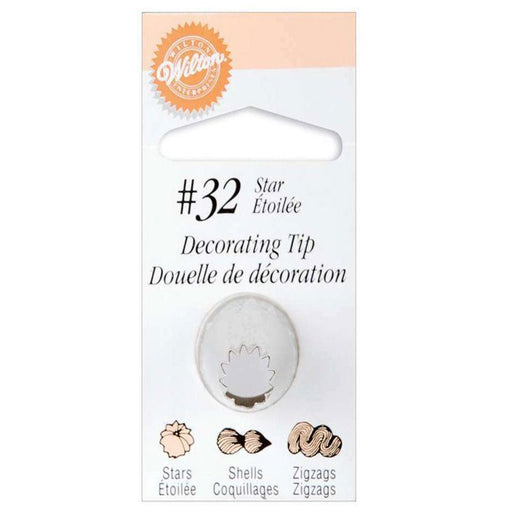 Wilton #32 decorating tip in retail packaging, labeled as a star tip. The metal tip is shown mounted on a white backing card with examples of its icing patterns—stars, shells, and zigzags—illustrated at the bottom.
