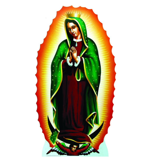 Life-size cutout of Our Lady of Guadalupe. The Virgin Mary is depicted with a green cloak adorned with gold stars, draped over a rose-colored gown. She stands with hands clasped in prayer, surrounded by radiant golden light and an ornate red-orange mandorla. At her feet is a cherub with multicolored wings supporting her with a crescent moon beneath.