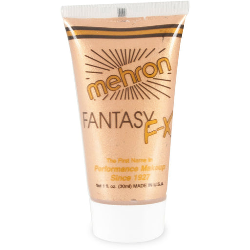 Tube of Mehron Fantasy F-X performance makeup in a metallic gold color, with a white cap and sunburst design on the front label.