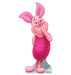 Cardboard cutout of Piglet from Winnie the Pooh, shown standing with one hand shyly placed on his cheek and a sweet smile. His body is light pink, and he wears a darker pink striped outfit. His large ears curve gently with bright pink inner coloring. He stands with one leg crossed over the other, casting a soft shadow onto the light blue base beneath him against a white background.