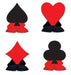 Playing card centerpiece decorations featuring the four classic suits: spade, heart, diamond, and club. Each suit is represented in bold colors—black for spades and clubs, red for hearts and diamonds. The suits sit atop fan-shaped paper bases in matching red and black, giving a 3D festive appearance suitable for a casino-themed party or event.