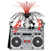 80's themed boombox centerpiece featuring a large, silver and black retro boombox with cassette tape deck illustration. On top is a spray of metallic black and red foil strands, accented with red and black musical note cutouts cascading outward.