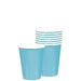 Eight Caribbean blue paper cups with white rims; seven are stacked neatly in the background and one is positioned in front to display its full shape and size.