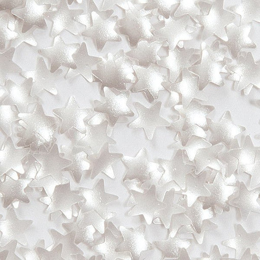 A close-up image of silver edible star-shaped sprinkles, commonly used as cake or dessert decorations. The stars have a shiny, metallic silver appearance.