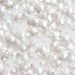 A close-up image of silver edible star-shaped sprinkles, commonly used as cake or dessert decorations. The stars have a shiny, metallic silver appearance.