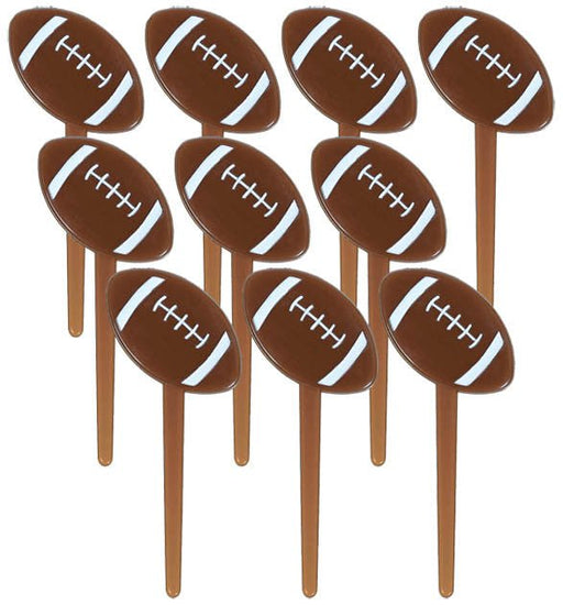 Set of brown football-shaped party picks with white laces, arranged in a scattered standing pattern.