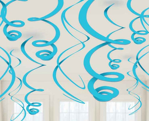 Caribbean blue spiral streamers hanging from the ceiling in a room with white walls and large windows.