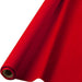 Roll of red table cover partially unrolled with plastic flowing to the right, displayed diagonally against a white background.