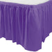 Purple plastic table skirt with gathered pleats attached around the edge of a rectangular table.