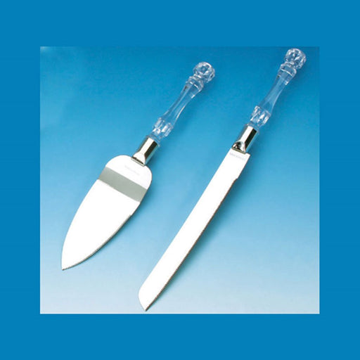 Clear-handled serving utensil set featuring a stainless steel cake knife and pie server. Both utensils have elegant, faceted clear plastic handles and polished silver blades, ideal for weddings, anniversaries, and formal events.