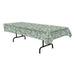 Tablecloth with a money print design featuring images of green U.S. dollar bills draped over a rectangular table.