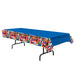Plastic rectangular tablecloth with a solid blue top and international flag border featuring flags of the United States, United Kingdom, Canada, Brazil, China, Japan, South Korea, Germany, France, Italy, Mexico, Greece, Argentina, South Africa, Ireland, Sweden, Australia, Switzerland, Spain, and the European Union – perfect disposable table cover for global events, classroom activities, and international celebrations
