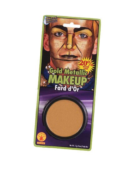 A packaged container of gold metallic makeup, designed to create a shiny, metallic gold effect on the skin. The packaging features an image of a person with bold gold makeup covering their face for a dramatic, costume-ready look. The makeup is water washable and suitable for theatrical use, costumes, and special effects.
