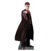 Life-size cardboard cutout of Harry Potter in a black robe, standing with one arm extended forward and holding a wand, posed as if casting a spell.