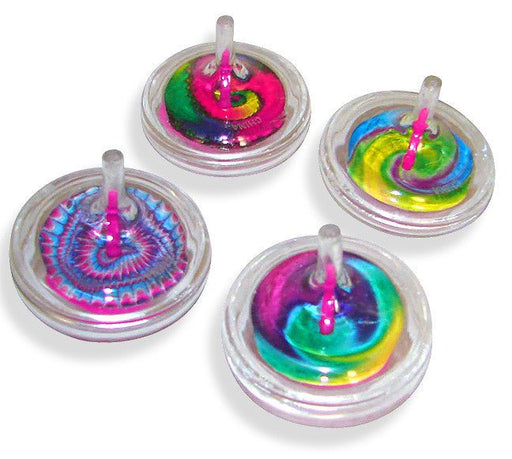 A set of colorful spiral tops with clear plastic outer shells and bright, swirling spiral designs in pink, blue, green, yellow, and purple. Each top has a central pink peg for spinning, creating a mesmerizing effect as the spiral patterns blur together when spun. These toys are designed for simple, playful entertainment.