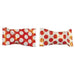 Two pieces of red candy with white polka dot wrappers, shown side by side with a gap in the middle where they have been separated.