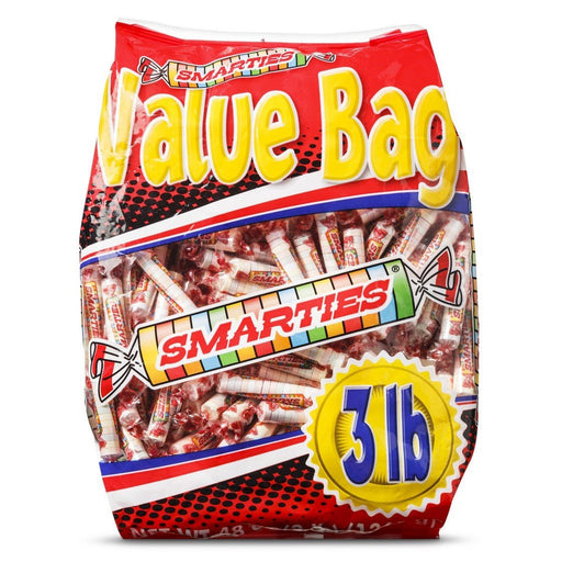 A large 3 lb value bag of Smarties candy rolls in red packaging with bold yellow and white lettering.