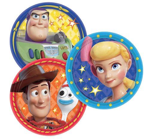 Round party plate featuring characters from Toy Story. Woody is in the front, with Bo Peep, Forky, and Buzz Lightyear behind him. The plate has a blue border decorated with orange stars.