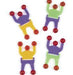 Set of four colorful wall-climbing toy figures with flexible bodies in purple, yellow, and green, each with red sticky suction cups on hands and feet.