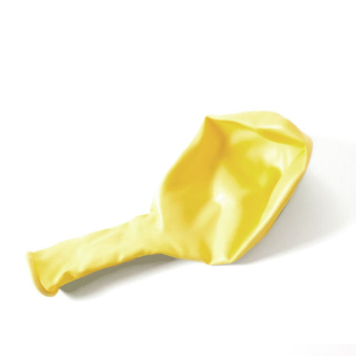 Single uninflated matte yellow balloon lying flat on a white background.
