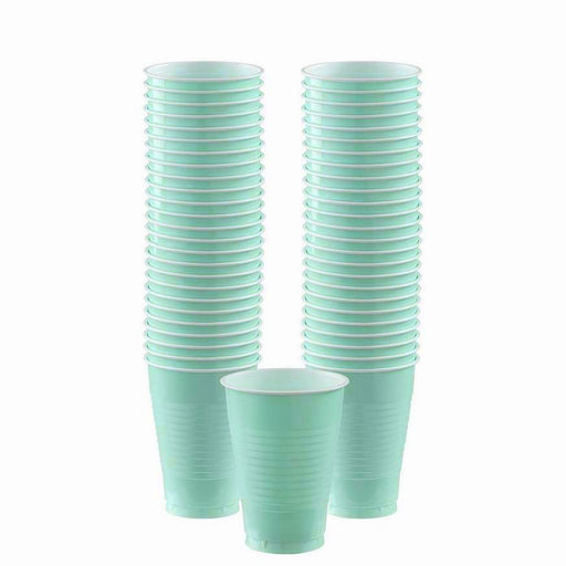 Stacks of light green plastic cups arranged in two tall columns with one cup placed in front, each with a slightly flared rim and ribbed sides.