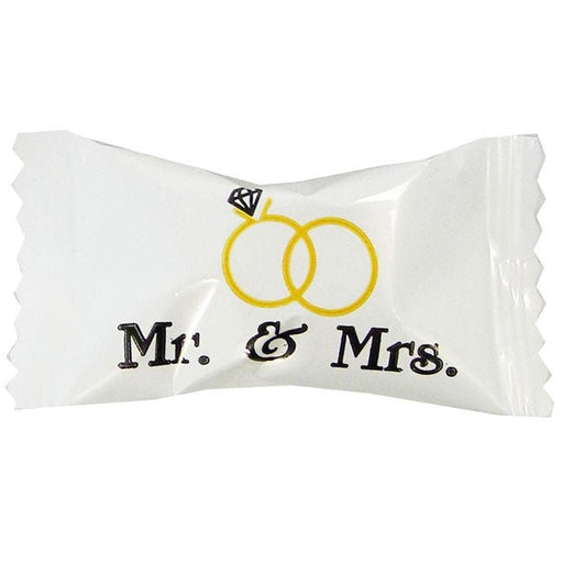 Individually wrapped buttermint cream candy in white packaging, featuring two interlocking gold wedding rings with a diamond and the words 'Mr. & Mrs.' printed below.