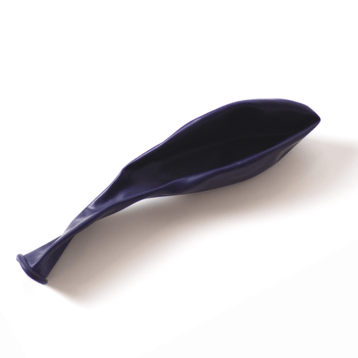 Deflated dark blue latex balloon lying flat on a white background, with the balloon neck extended and opening visible.