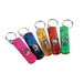 Set of five colorful plastic whistle keychains, each with a built-in compass. The whistles are pink, blue, yellow, red, and green, each attached to a metal key ring.