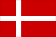 Rectangular flag with a red background featuring a white Scandinavian-style cross. The vertical part of the cross is shifted toward the hoist side, and both lines extend to the edges of the flag.