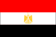 A horizontal tricolor flag with three equal bands: red on top, white in the middle, and black at the bottom. In the center of the white band is a gold eagle emblem.