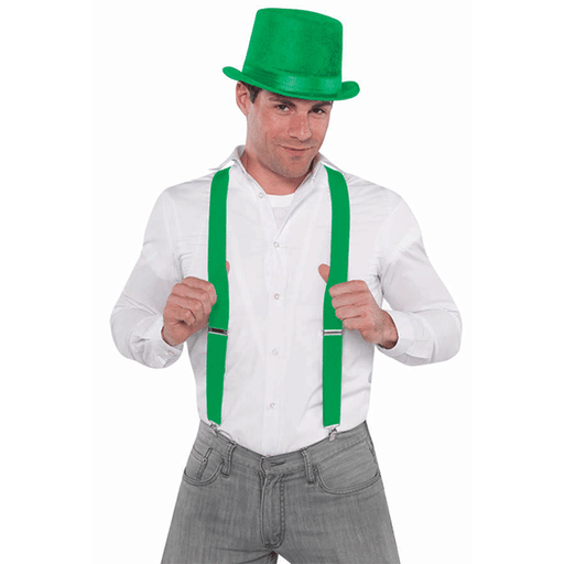 Man wearing bright green suspenders over a white button-down shirt and blue jeans. The suspenders feature silver clips attaching to the waistband and adjustable straps for a secure fit, suitable for costumes, formalwear, or fashion accessories.