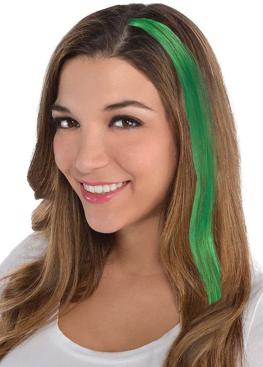 Model wearing a long, straight green hair extension clipped into brown hair – vibrant synthetic strand adds a bold pop of color, perfect for parties, costumes, spirit days, or fun fashion accents.