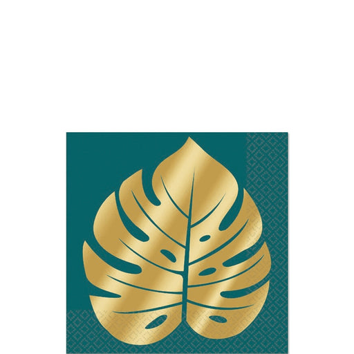 Tropical-themed party napkin with a dark teal background featuring a large gold foil monstera leaf design in the center.