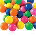 A pile of colorful bouncy balls in assorted bright colors including yellow, orange, pink, green, and blue.