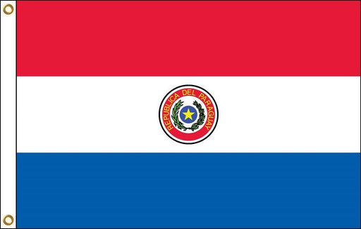 A horizontal tricolor flag with red on top, white in the middle, and blue on the bottom. The center features a circular emblem with a yellow star surrounded by a wreath and the words 'República del Paraguay.'