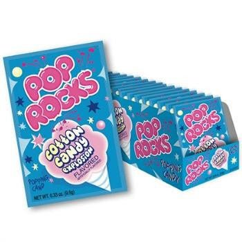Display box of Pop Rocks Cotton Candy Explosion popping candy packets in blue packaging with pink and white lettering.