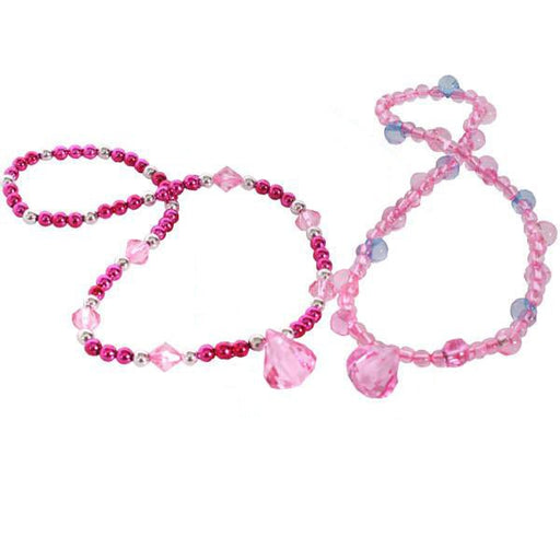 Two beaded jewelry sets in shades of pink and purple, each consisting of a necklace and matching bracelet, featuring round and faceted beads with a large faceted pink heart pendant.
