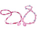 Two beaded jewelry sets in shades of pink and purple, each consisting of a necklace and matching bracelet, featuring round and faceted beads with a large faceted pink heart pendant.