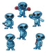 Set of six small blue alien figurines with black oval eyes, each in a different pose or costume. One is wearing red boxing gloves, another is holding a drink, one is in a skirt with a red bow, one is saluting, another holds a red flashlight, and one has a red bat. All figures share a metallic blue finish and cartoonish design.