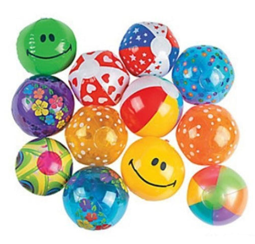 Assortment of twelve small inflatable beach balls in various bright colors and patterns, including smiley faces, hearts, stars, polka dots, multicolor panels, flowers, and patriotic red, white, and blue designs. The balls are arranged closely together against a white background.