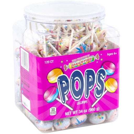 Clear plastic container of 120 Smarties Pops with bright pink label, bold 'POPS' text, and colorful lollipop graphics – includes assorted fruit-flavored lollipops in red, green, orange, blue, and purple wrappers – 34 oz tub perfect for parties, classrooms, or candy displays.