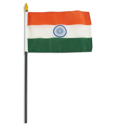 Rectangular flag with three horizontal stripes: orange at the top, white in the middle, and green at the bottom. A blue wheel with 24 spokes is centered in the white stripe. The flag is mounted on a black pole with a white sleeve and a gold spear-shaped tip.